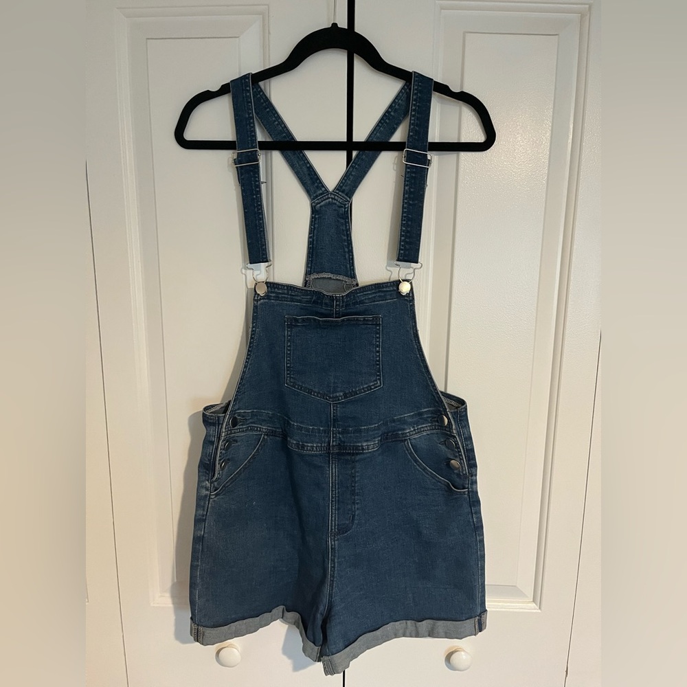 Denim overall shorts.